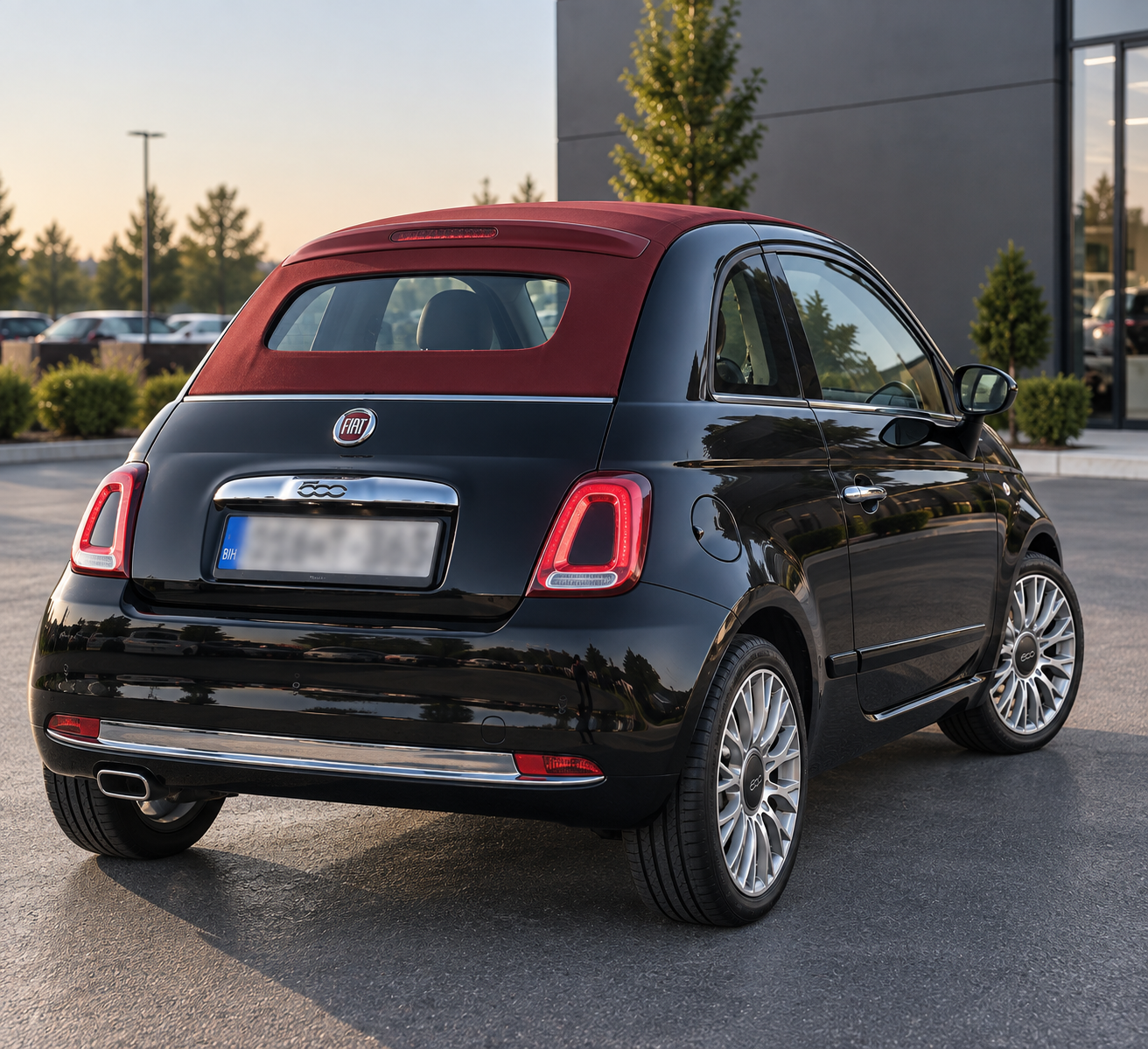 Fiat 500C rear view with red convertible top